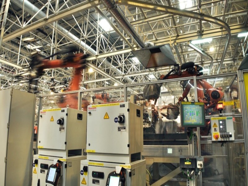 industrial robotic assembly and inspection line for advanced manufacturing applications
